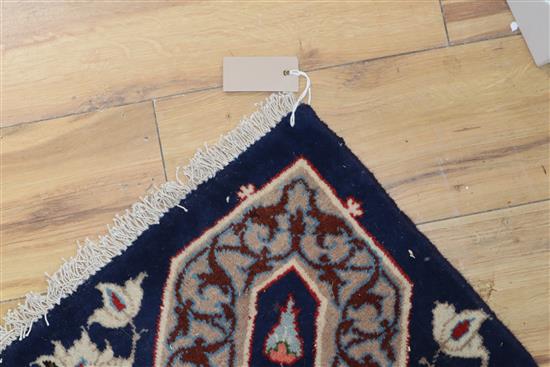 A Tabriz blue ground carpet,